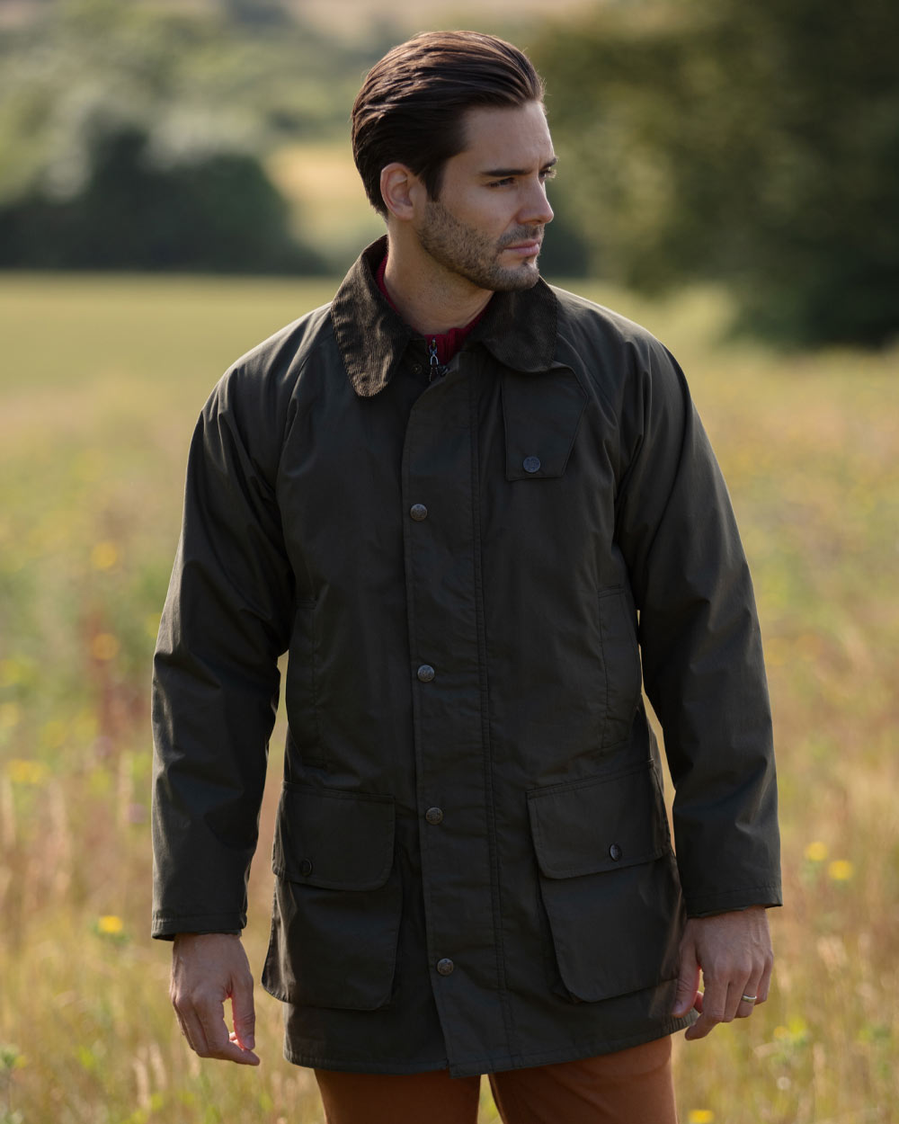 Olive coloured Alan Paine Surrey Mens Jacket on street country field 