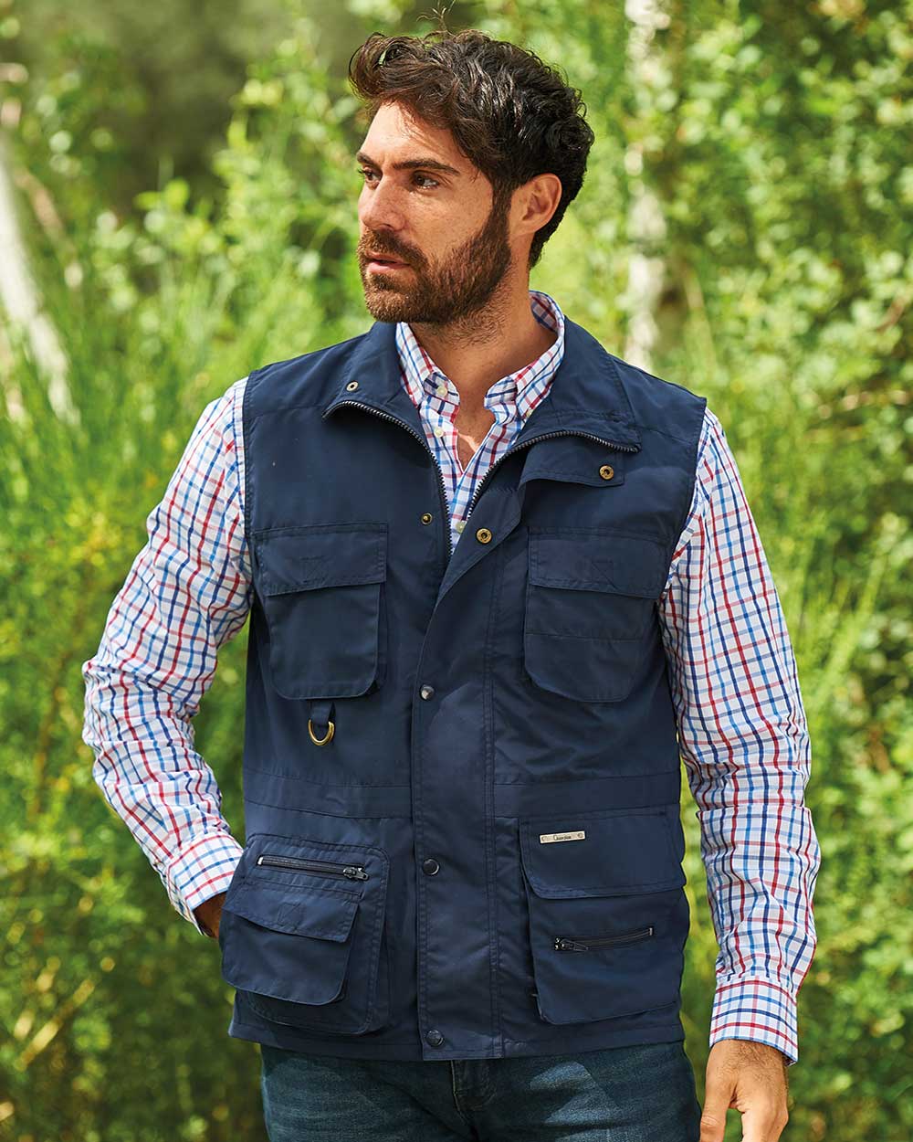 Man wearing Champion Windermere Gilet multi pocket waistcoat In Navy 