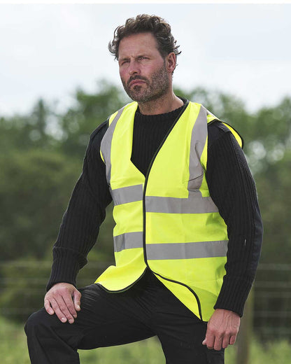 Man wearing Yellow Fort Hi-Vis Vest with reflective strips 