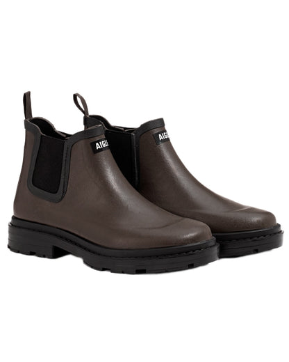 Brown coloured Aigle Chelsea Rain Ankle Boots on white background 