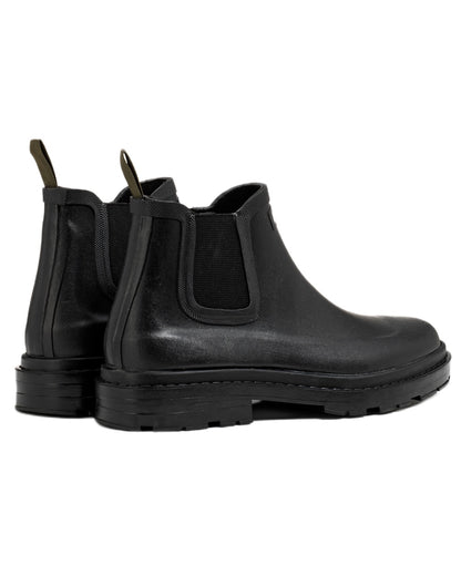 Noir coloured Aigle Chelsea Rain Ankle Boots on white background 