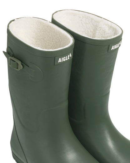 Khaki coloured Aigle Childrens Woody Pop Fur 2 Boots on white background 