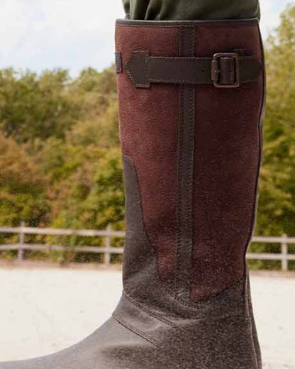 Dark Brown coloured Aigle Mens Inverss Gore-Tex Leather Boots on sand background 