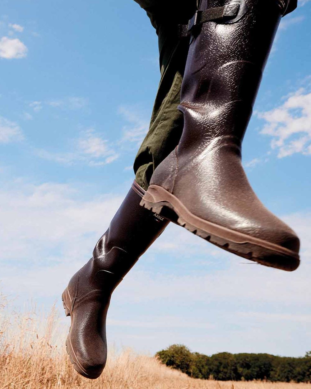 Brown coloured Aigle Mens Terra Pro Vario Adjustable Wellingtons on outdoor background 
