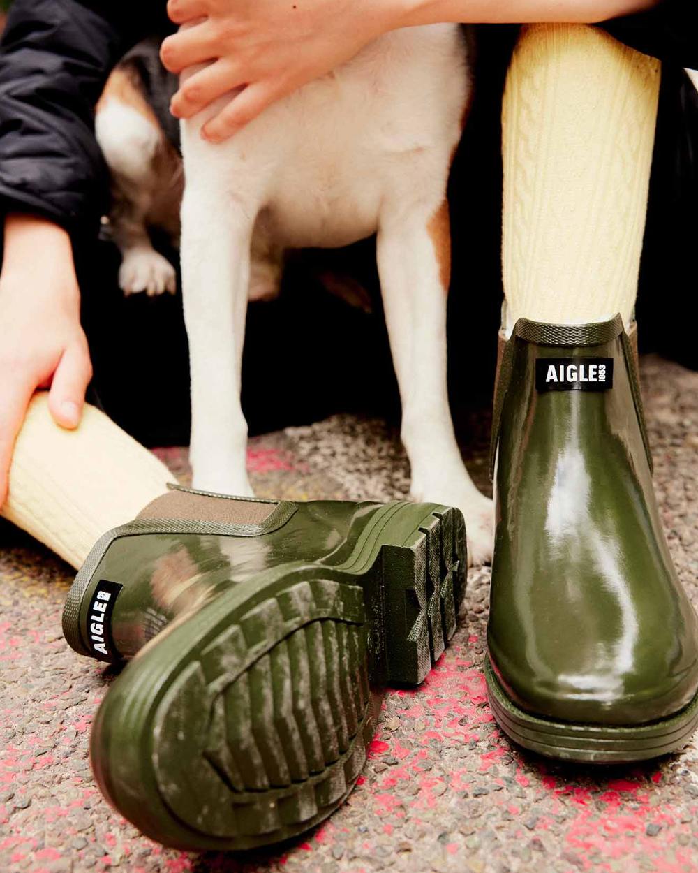 Khaki coloured Aigle Womens Carville Fur 2 Ankle Rain Boots on outdoor background 