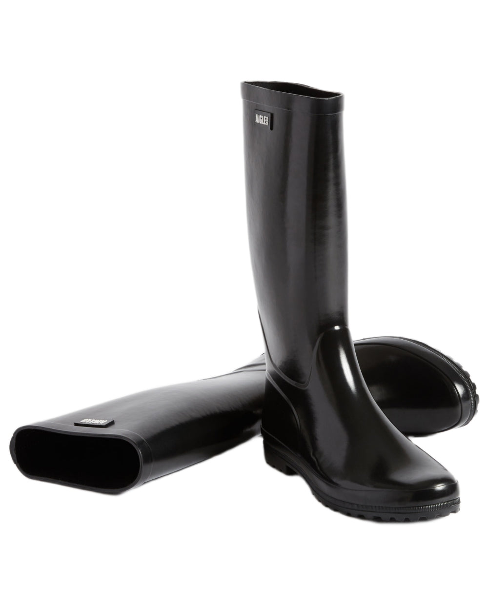 Noir coloured Aigle Womens Eliosa Wellingtons on white background 