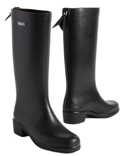 Noir coloured Aigle Womens Myrica Wellingtons on white background 