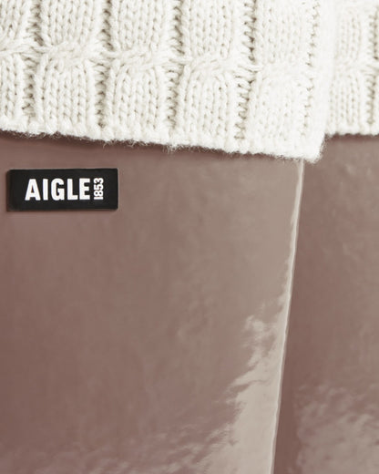 Chestnut coloured Aigle Womens Eliosa Fur Lined Wellingtons on white background 