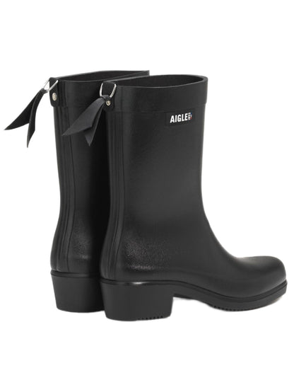 Noir coloured Aigle Womens Myrica Mid Ankle Boots on white background 