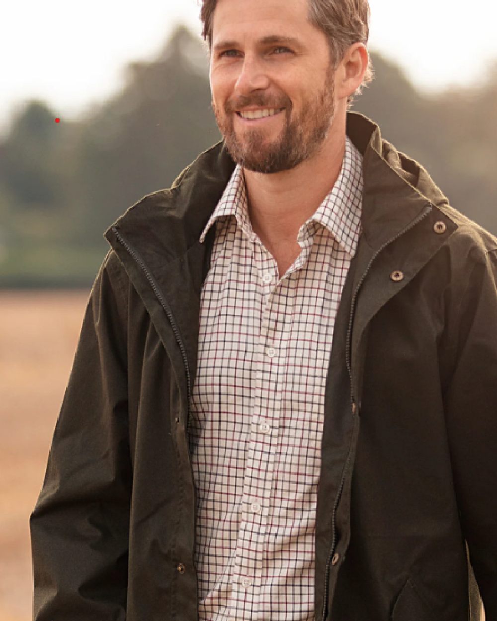 Red coloured Alan Paine Aylesbury Check Shirt on blurry background 