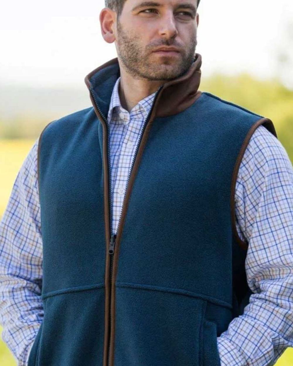 Blue Steel coloured Alan Paine Aylsham Fleece Jacket on blurry background 