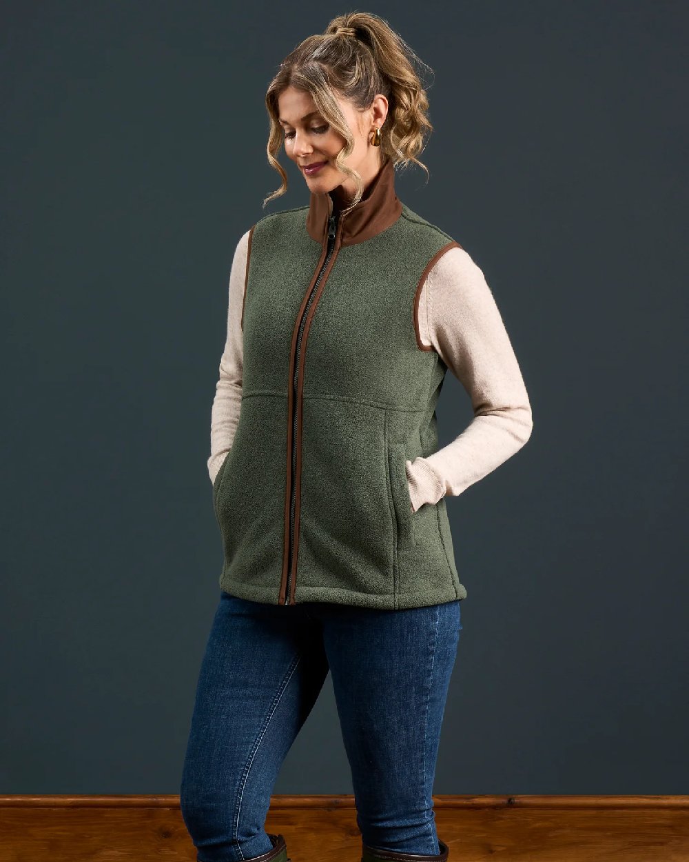 Cedar Coloured Alan Paine Aylsham Ladies Fleece Gilet on indoor background 
