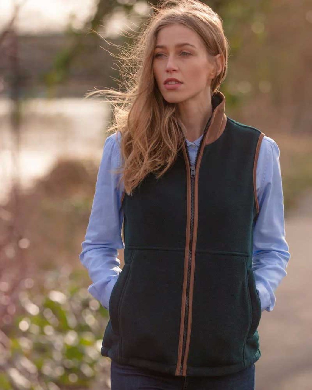 Dark Navy Coloured Alan Paine Aylsham Ladies Fleece Gilet on blurry background 