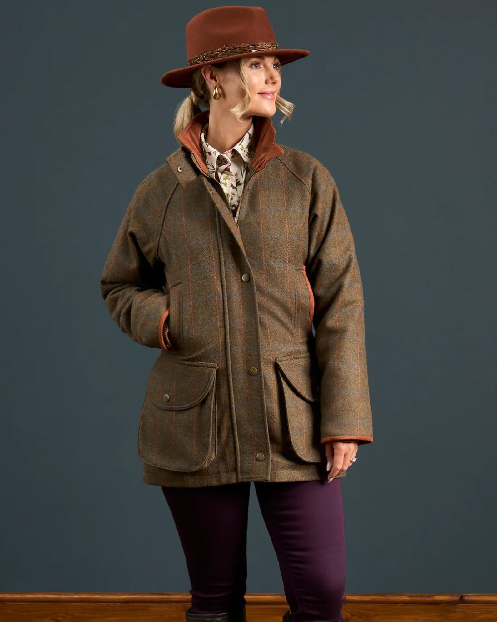 Willow coloured Alan Paine Combrook Ladies Tweed Coat on indoor background 