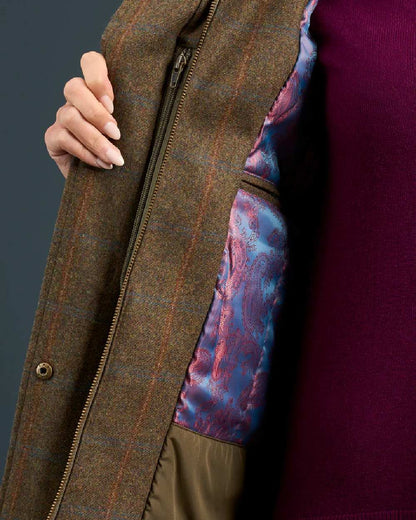 Willow coloured Alan Paine Combrook Ladies Tweed Coat on indoor background 
