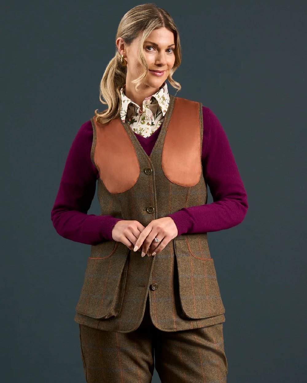 Willow coloured Alan Paine Combrook Ladies Tweed Shooting Waistcoat on indoor background 