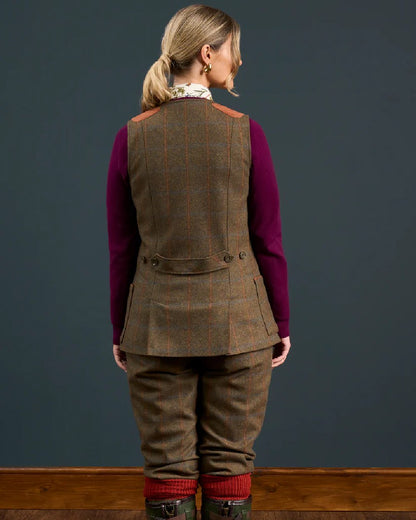 Willow coloured Alan Paine Combrook Ladies Tweed Shooting Waistcoat on indoor background 