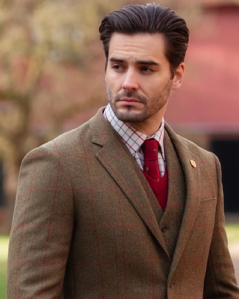 Sage coloured Alan Paine Combrook Mens Tweed Sports Blazer on outdoor background 