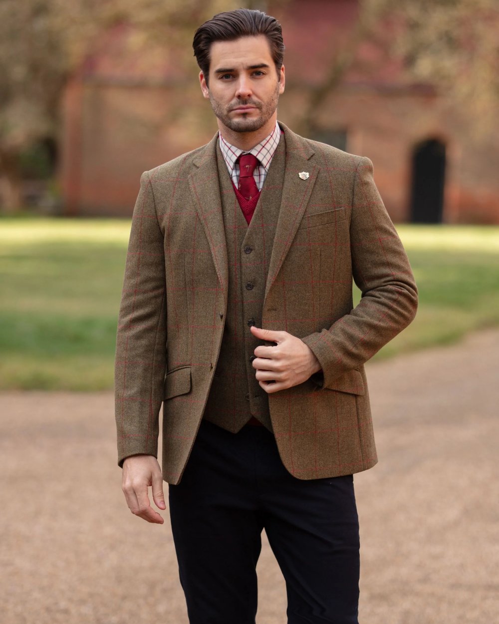 Sage coloured Alan Paine Combrook Mens Tweed Sports Blazer on outdoor background 