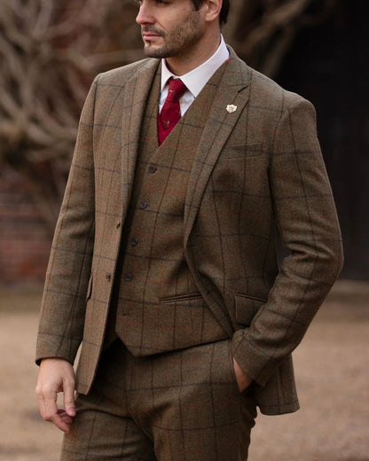 Thyme coloured Alan Paine Combrook Mens Tweed Sports Blazer on blurry background 