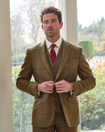 Thyme coloured Alan Paine Combrook Mens Tweed Sports Blazer on window background 