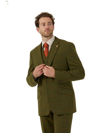 Maple coloured Alan Paine Combrook Mens Tweed Sports Blazer on blurry background 