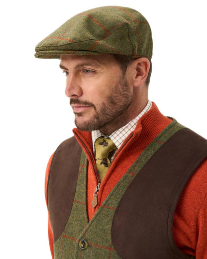 Reed coloured Alan Paine Combrook Tweed Cap on white background 