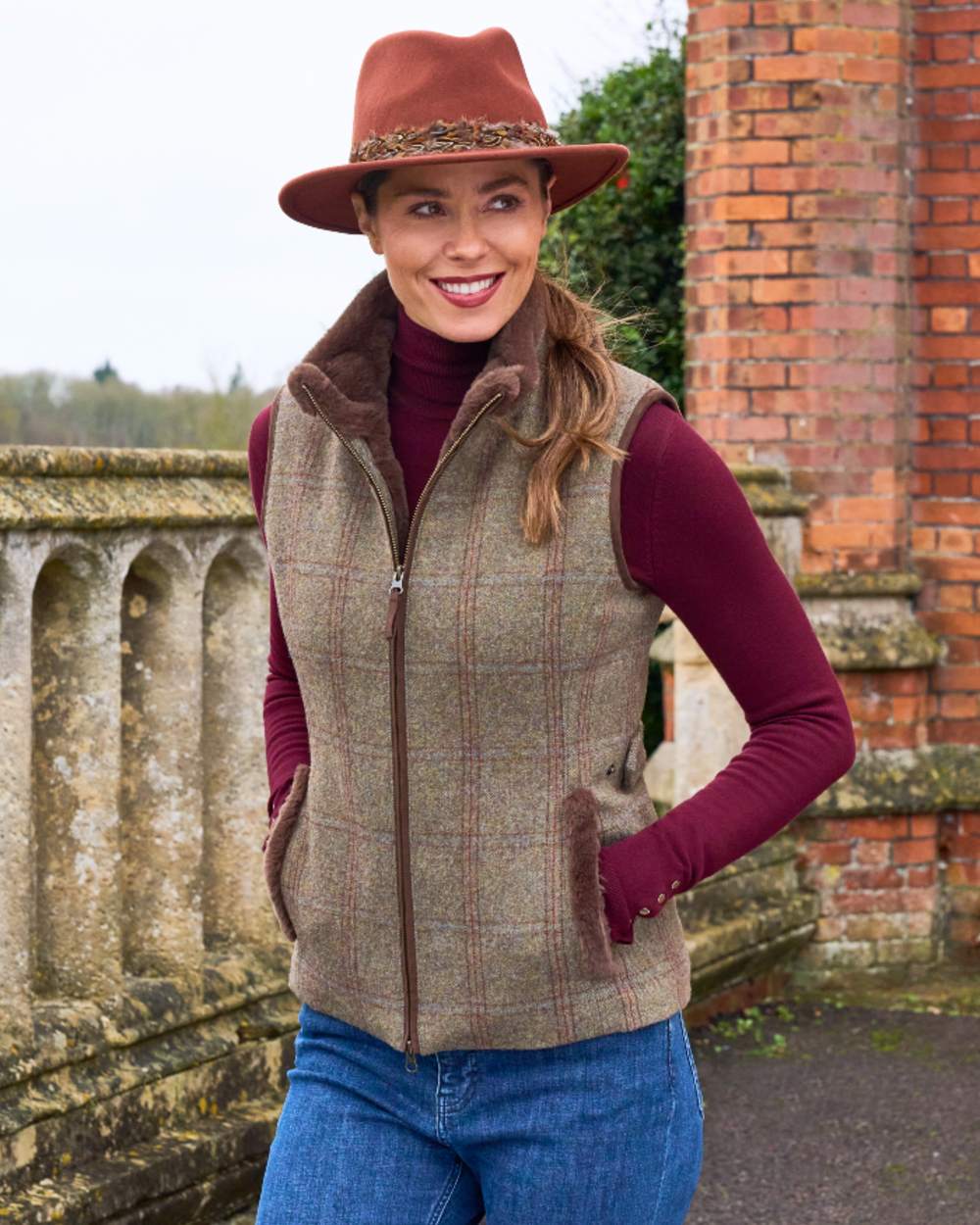 Laurel Coloured Alan Paine Combrook Tweed Ladies Gilet on outdoor background 