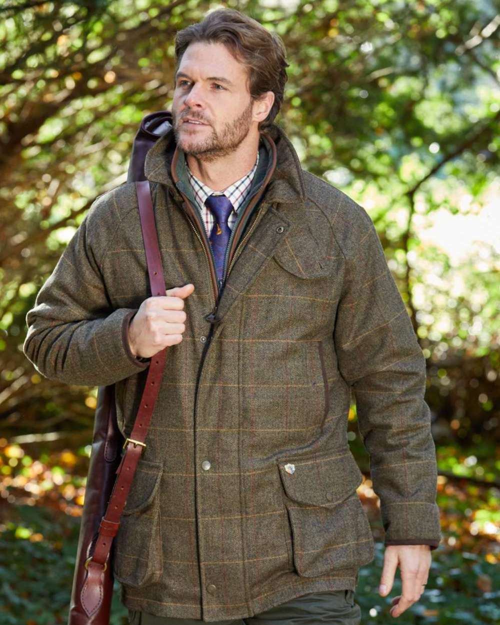 Teak coloured Alan Paine Combrook Tweed Waterproof Coat on forest background 