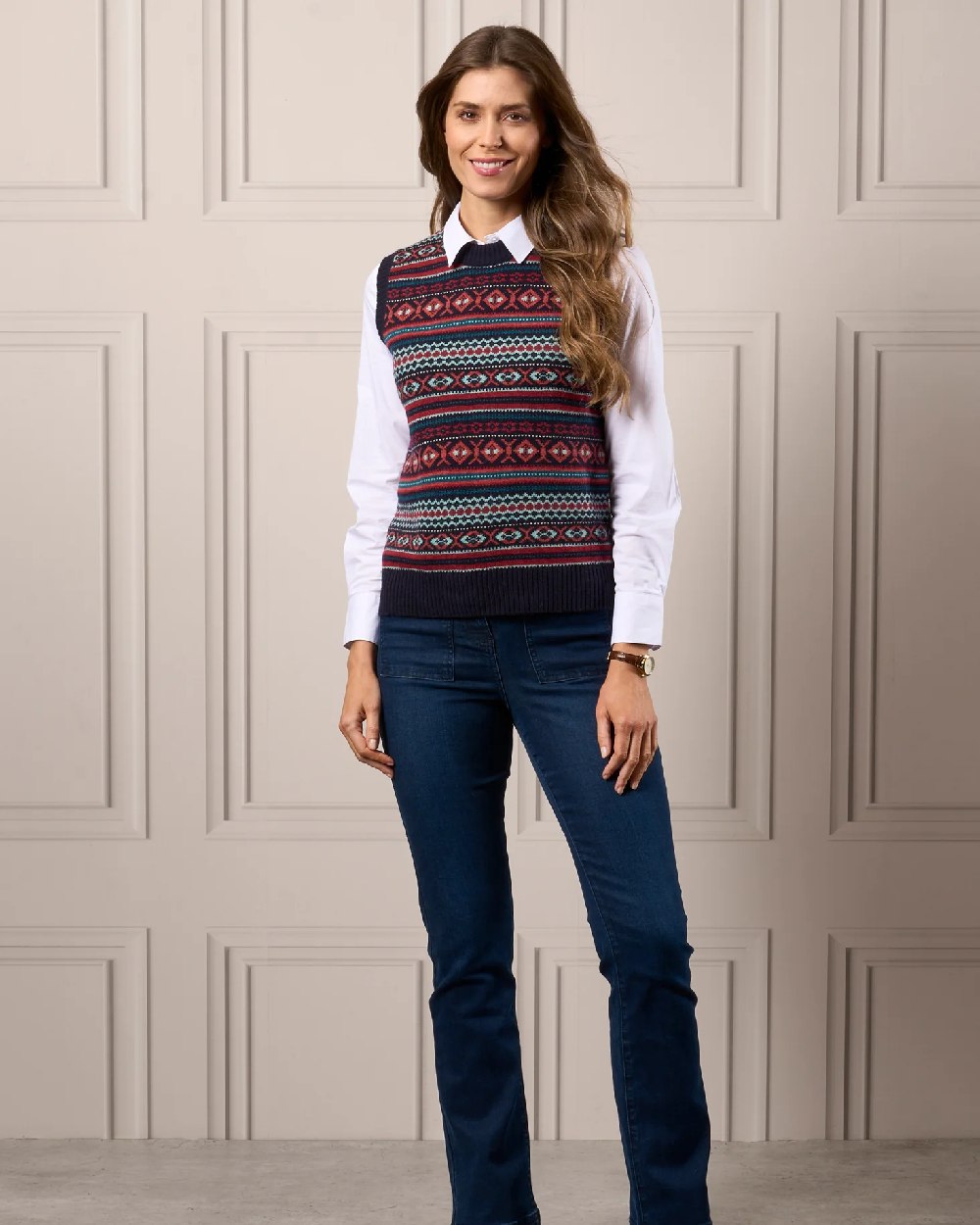 Navy coloured Alan Paine Ladies Amelia Fairisle Crew Neck Jumper on beige wall background 