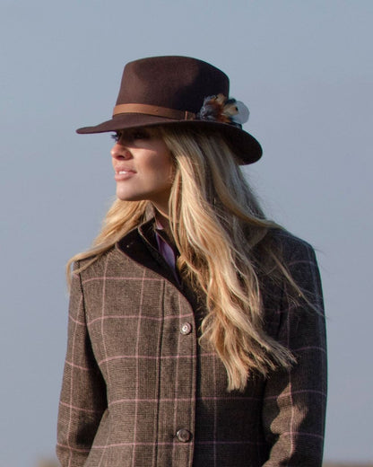 Brown coloured Alan Paine Ladies Richmond Felt Hat on sky background 