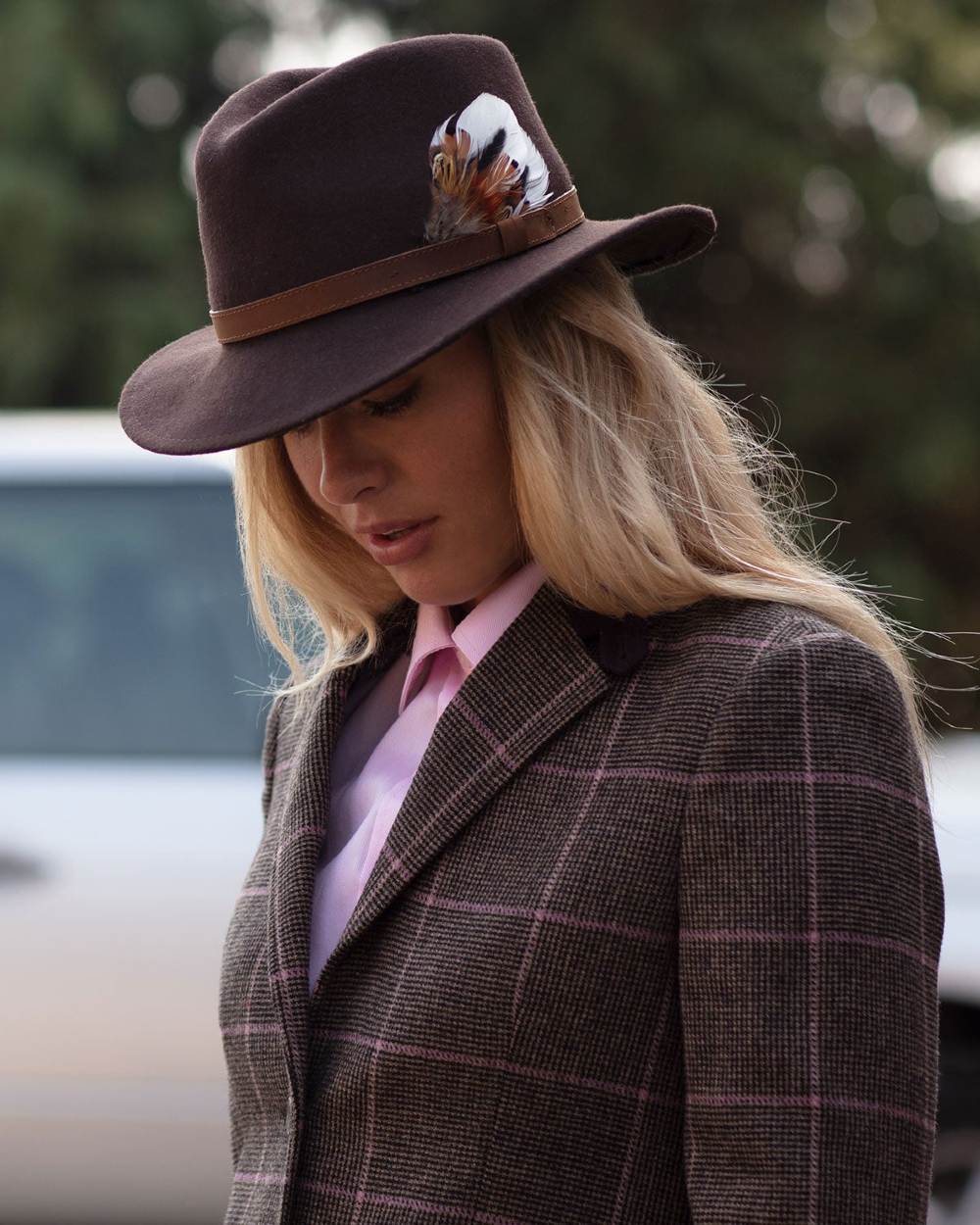 Brown coloured Alan Paine Ladies Richmond Felt Hat on blurry background 