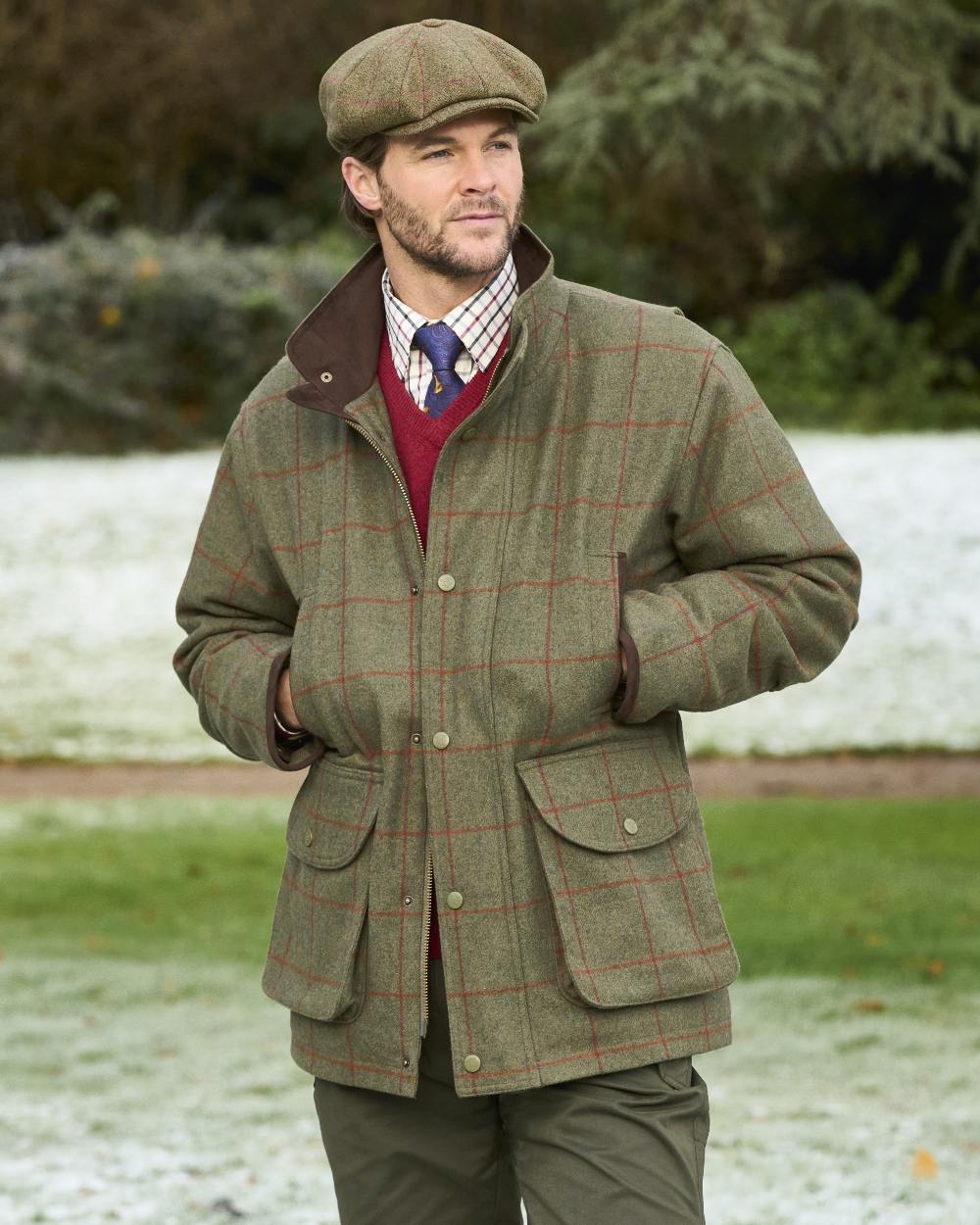 Reed coloured Alan Paine Mens Combrook Field Coat on forest background 
