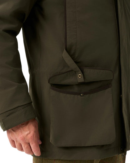 Olive coloured Alan Paine Mens Willsden Waterproof Coat on white background 