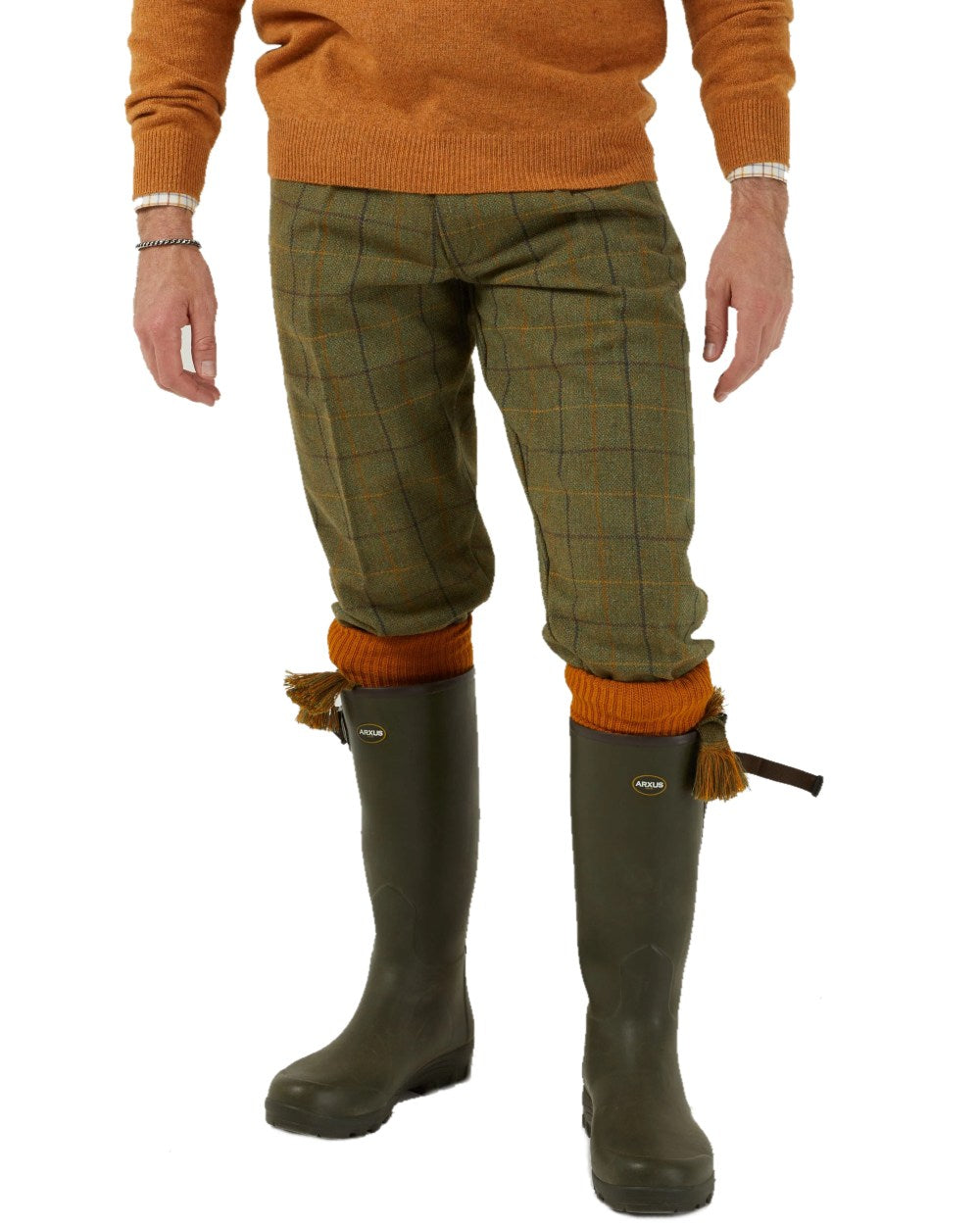 Dark Moss coloured Alan Paine Rutland Tweed Breeks on blurry background 