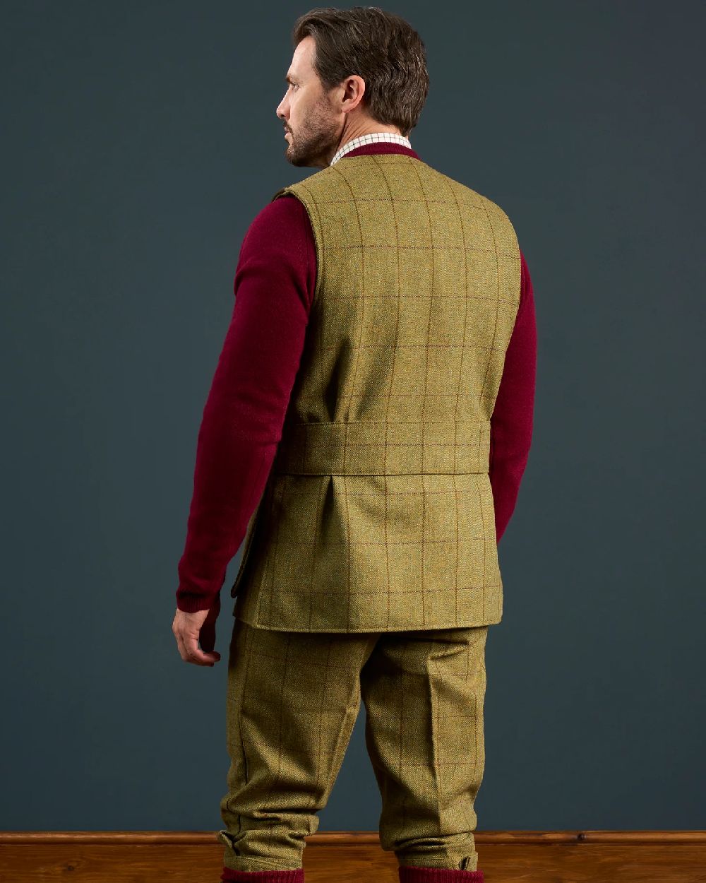 Lichen coloured Alan Paine Rutland Tweed Shooting Waistcoat on indoor background 