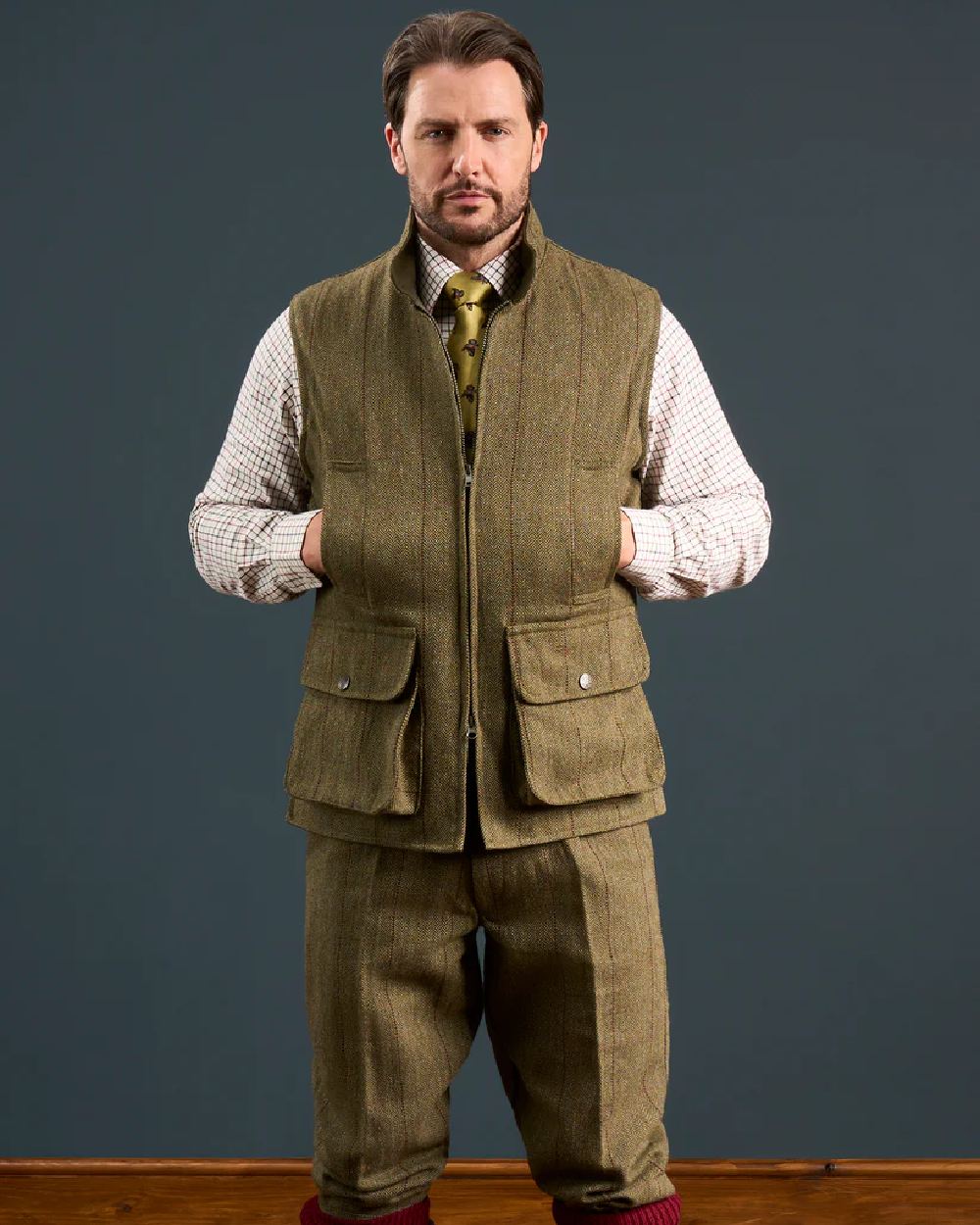 Oak coloured Alan Paine Rutland Tweed Waistcoat on indoor background 