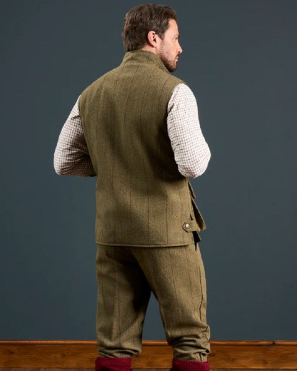 Oak coloured Alan Paine Rutland Tweed Waistcoat on indoor background 