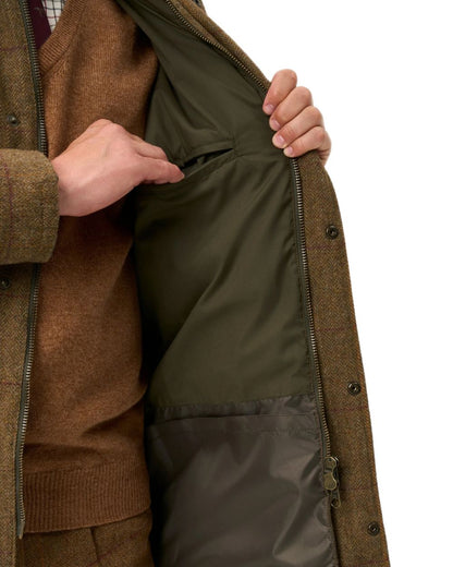 Birch coloured Alan Paine Rutland Waterproof Tweed Shooting Coat on white background 