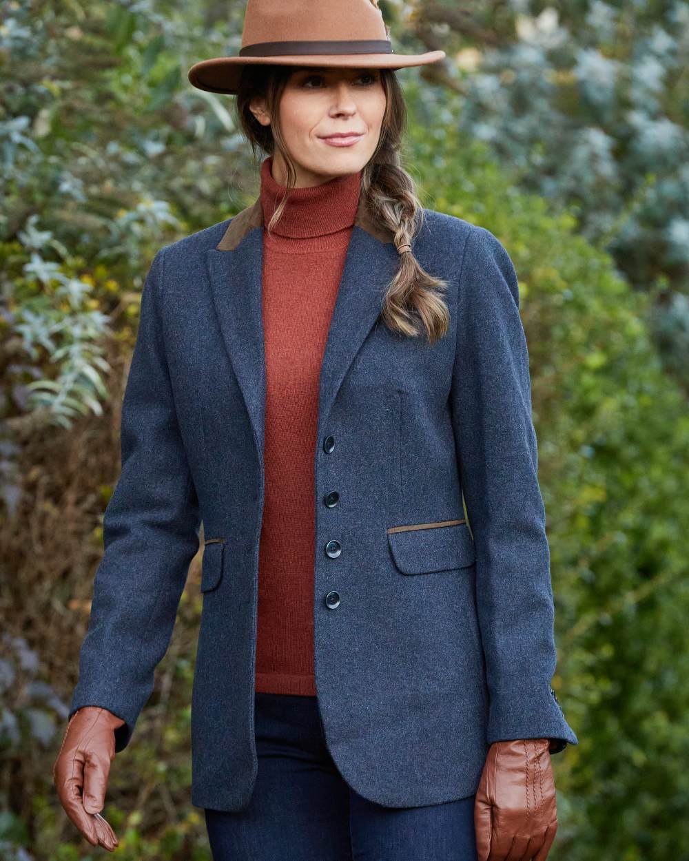 Blue coloured Alan Paine Surrey Ladies Tweed Blazer on leafy background 