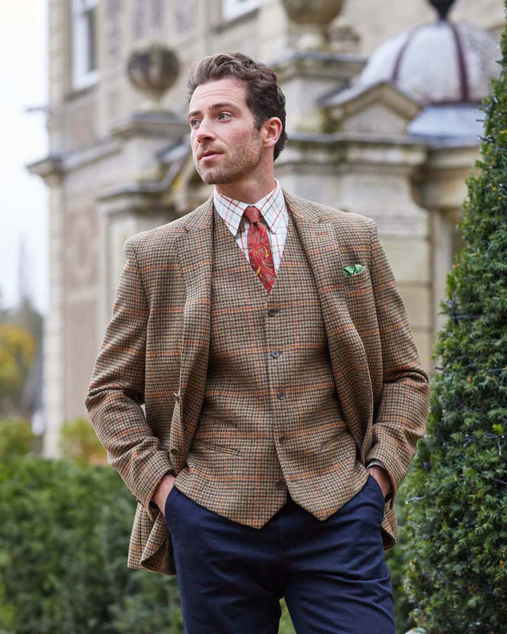 Sycamore coloured Alan Paine Surrey Mens Tweed Lined Blazer on blurry background 