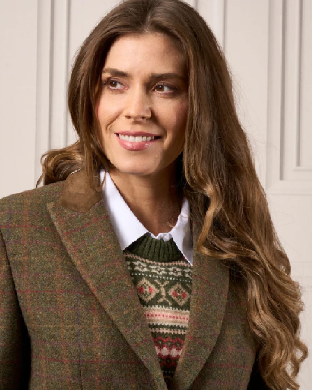 Hemlock coloured Alan Paine Surrey Mid-Thigh Tweed Coat on studio background 