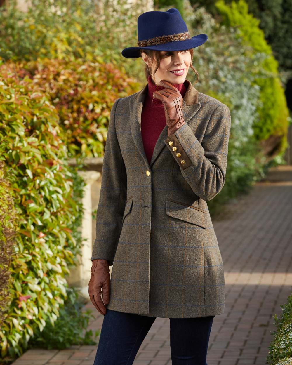 Marsh coloured Alan Paine Surrey Mid-Thigh Tweed Coat on park background 