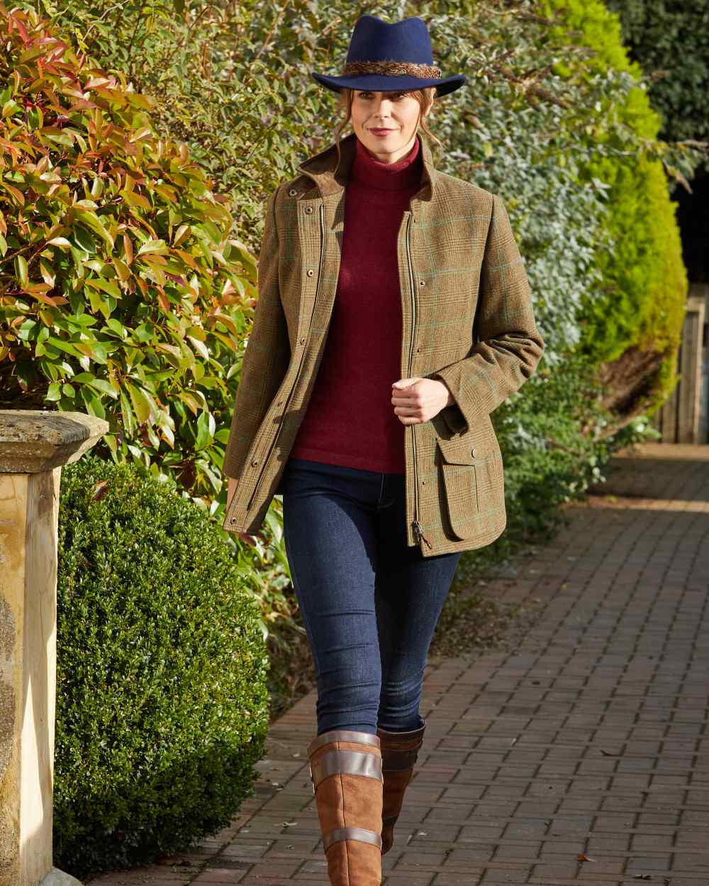 Marsh coloured Alan Paine Surrey Tweed Coat on park background 