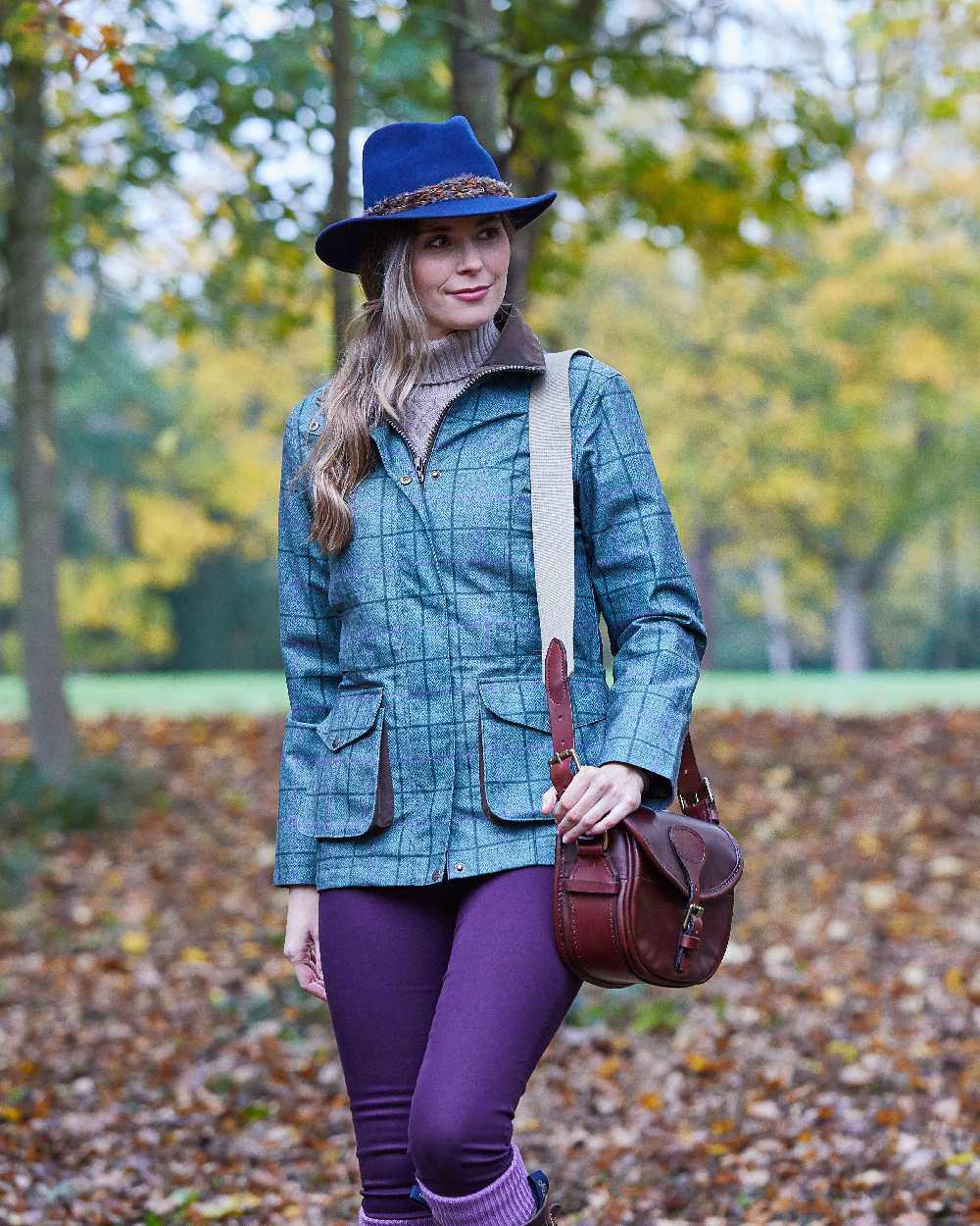 Seagrass coloured Alan Paine Womens Didsmere Coat on street background 