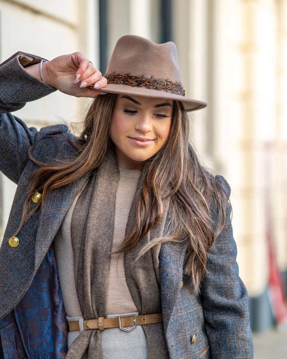 Mink Coloured Alan Paine Richmond Ladies Fedora On A Blurry Background 