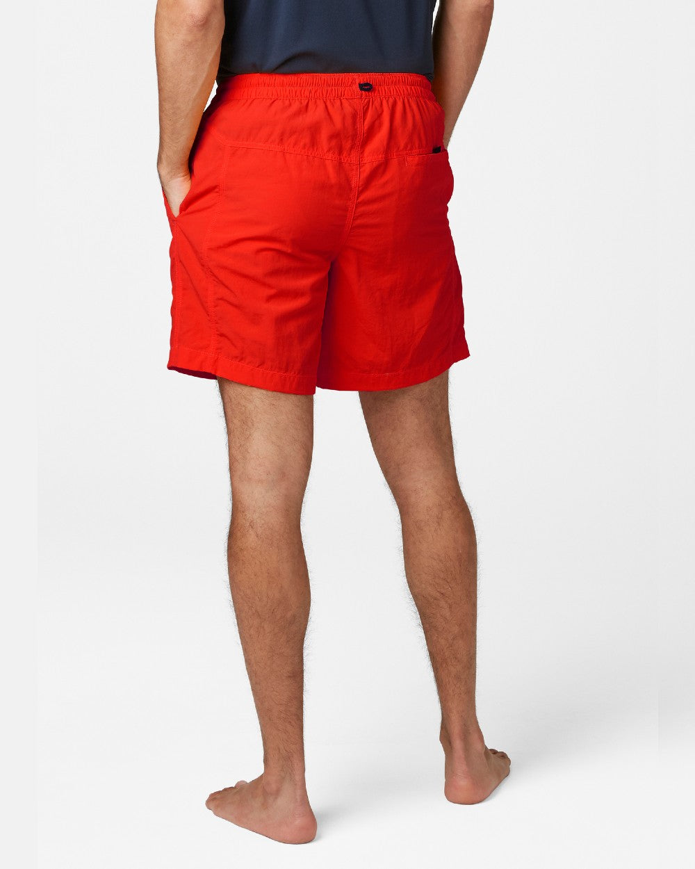 Alert Red coloured Helly Hansen Mens Calshot Trunks on a grey background 