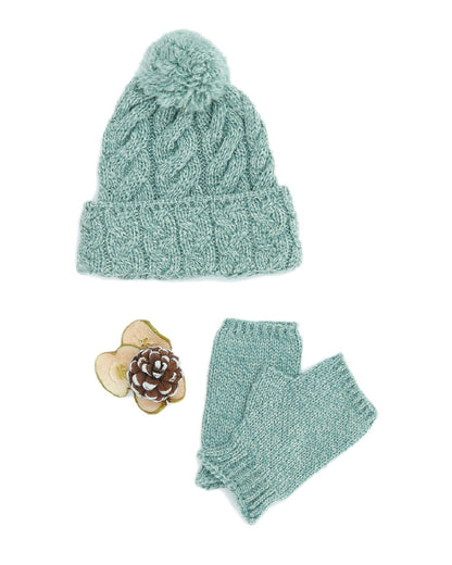 Mint Green Coloured Aran Chunky Knit Bobble Hat on white background 