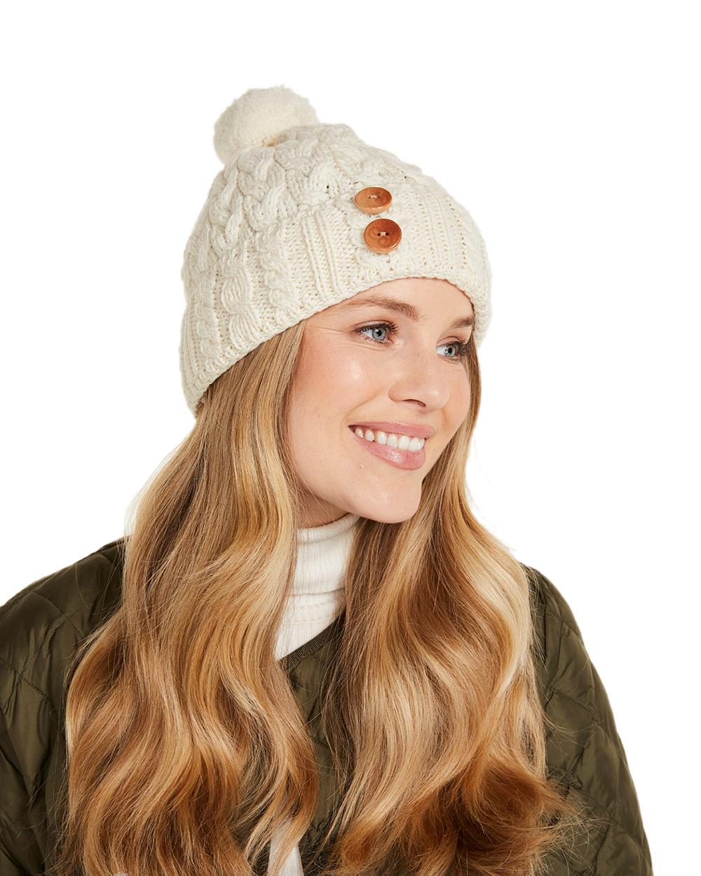 Cream Coloured Aran Chunky Knit Button Bobble Hat on white background 