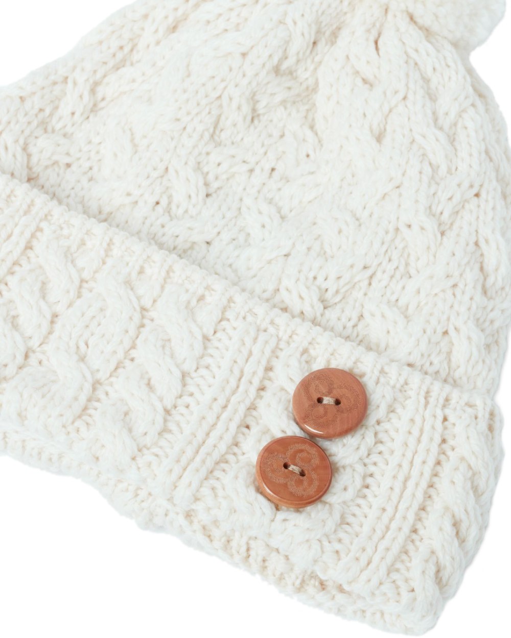 Cream Coloured Aran Chunky Knit Button Bobble Hat on white background 